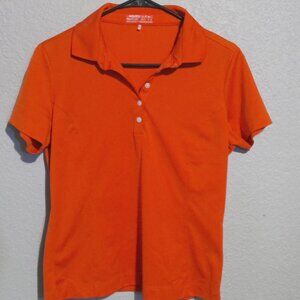Womens orange polo type Nike golf shirt. Fit Dry.
